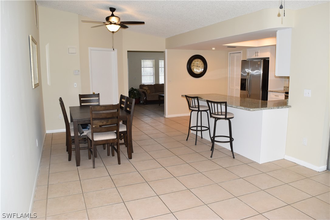 17404 Homewood Road Fort Myers, FL 33967 - Photo 9 of 26 a view of a livingroom with furniture and chandelier