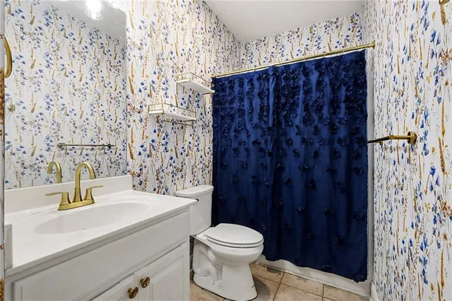 a bathroom with a sink and a toilet