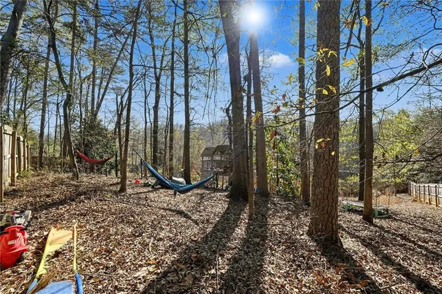 a view of a pathway with a yard