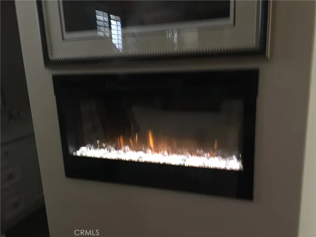 a view of room with a fireplace