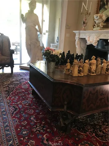 a room with water heater and wooden floor