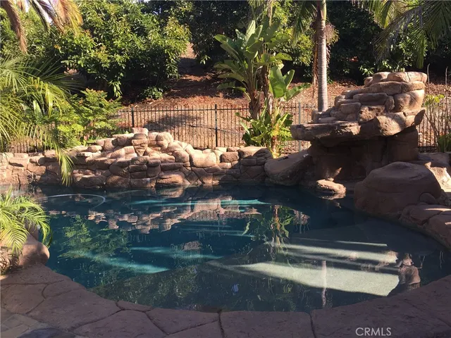 a view of yard along with trees