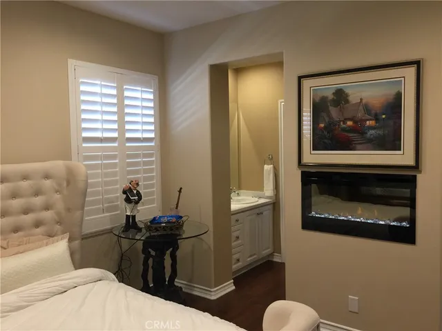 a bedroom with a bed and furniture