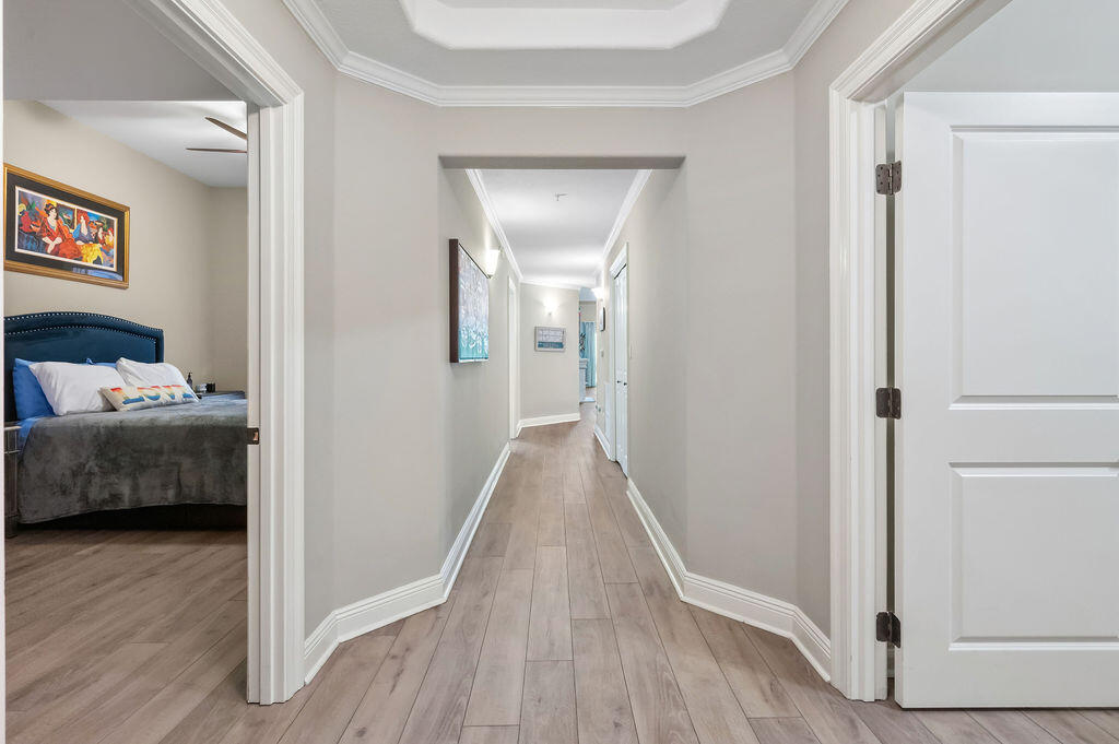 770 Harbor Boulevard, Unit 1D Destin, FL 32541 - Photo 13 of 59 a view of a bedroom from the hallway