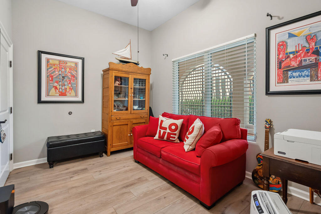 770 Harbor Boulevard, Unit 1D Destin, FL 32541 - Photo 20 of 59 a living room with furniture and a window