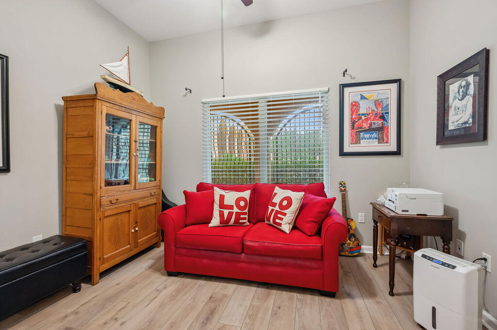 770 Harbor Boulevard, Unit 1D Destin, FL 32541 - Photo 21 of 59 a living room with furniture and a window