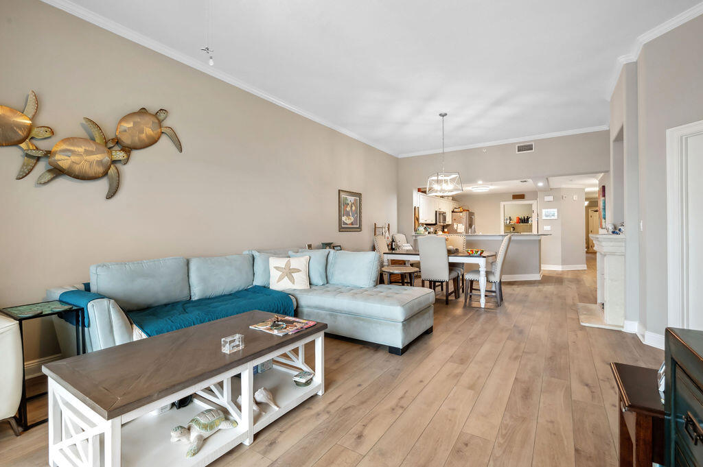 770 Harbor Boulevard, Unit 1D Destin, FL 32541 - Photo 39 of 59 a living room with furniture and wooden floor