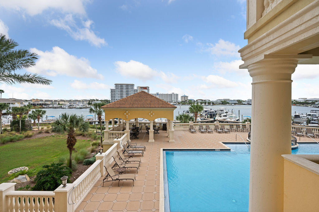 770 Harbor Boulevard, Unit 1D Destin, FL 32541 - Photo 43 of 59 a view of a lake with a terrace patio