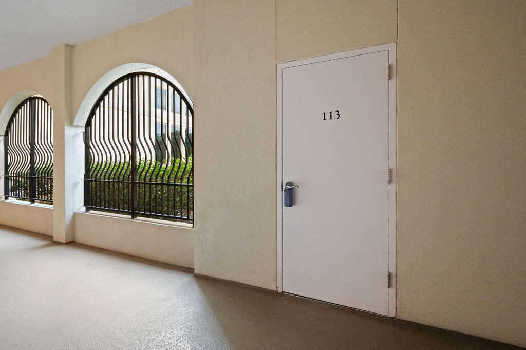 770 Harbor Boulevard, Unit 1D Destin, FL 32541 - Photo 46 of 59 a view of an entryway with a floor to ceiling window