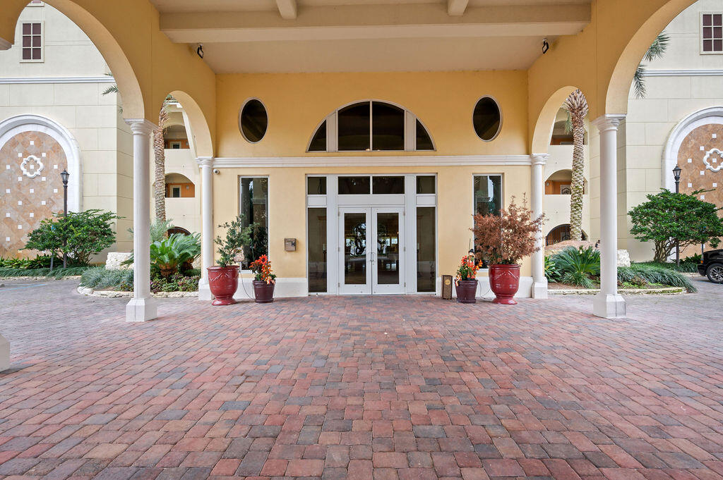 770 Harbor Boulevard, Unit 1D Destin, FL 32541 - Photo 8 of 59 a view of a large building with many windows