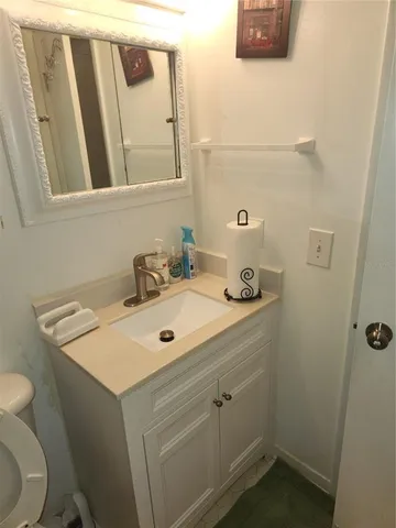 a bathroom with a sink and a toilet