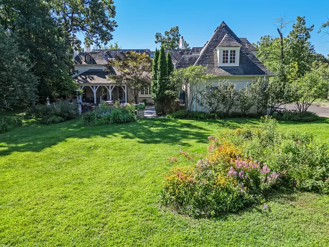 a picture of a room with a white wall and white appliances