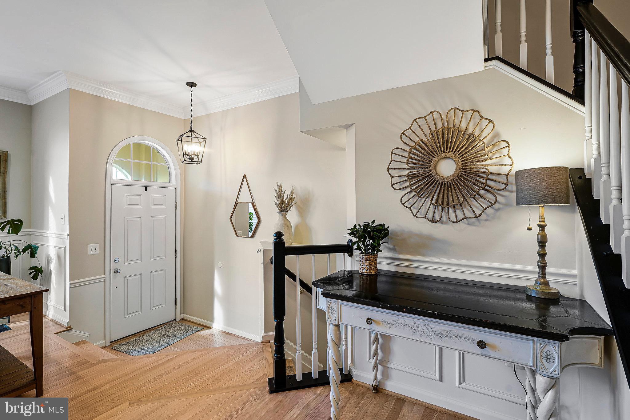 20876 Trinity Square Sterling, VA 20165 - Photo 3 of 50 a kitchen with a sink a refrigerator and cabinets