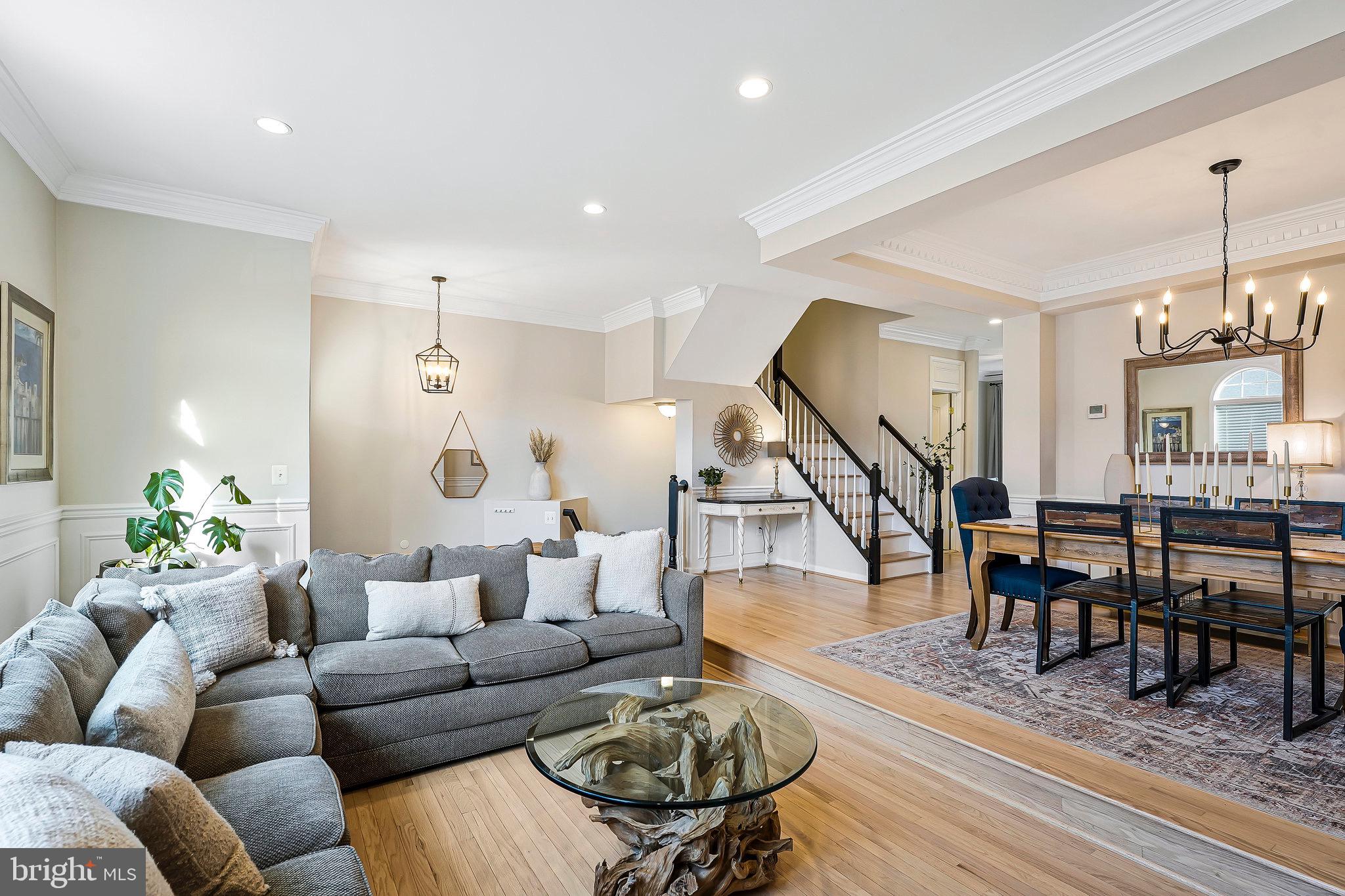 20876 Trinity Square Sterling, VA 20165 - Photo 4 of 50 a living room with furniture and wooden floor
