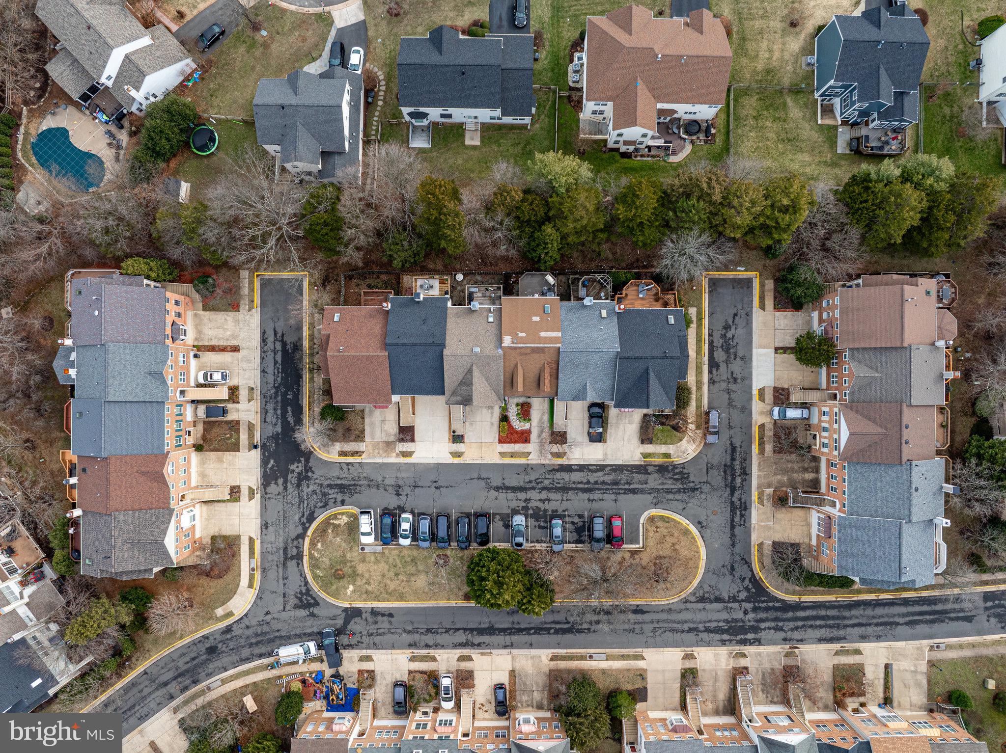 20876 Trinity Square Sterling, VA 20165 - Photo 42 of 50 an aerial view of residential houses with outdoor space and parking space