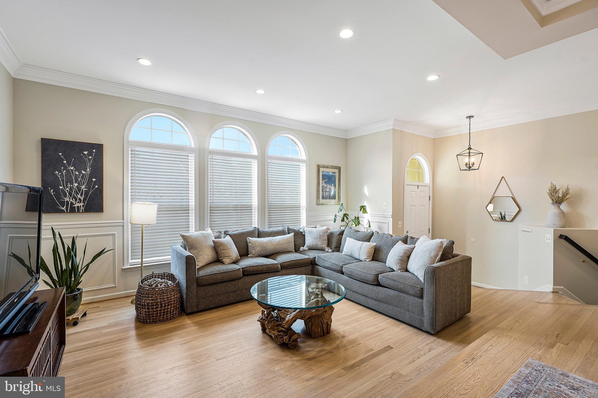 20876 Trinity Square Sterling, VA 20165 - Photo 5 of 50 a living room with furniture and a large window