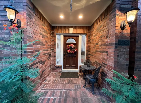 a view of a entryway door of the house and front of a house