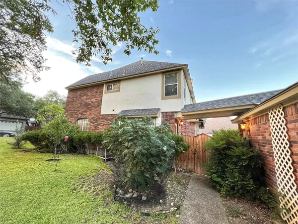 a view of a backyard with sitting area and fire pit