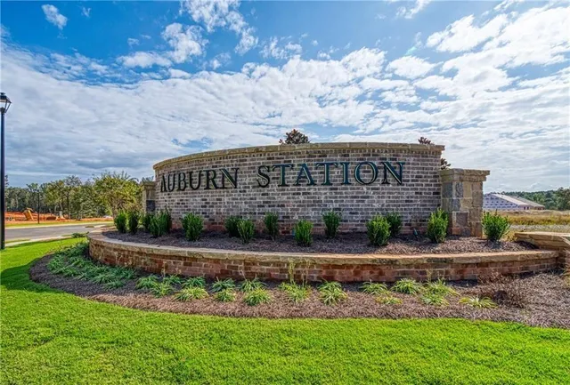 a view of a building with a yard