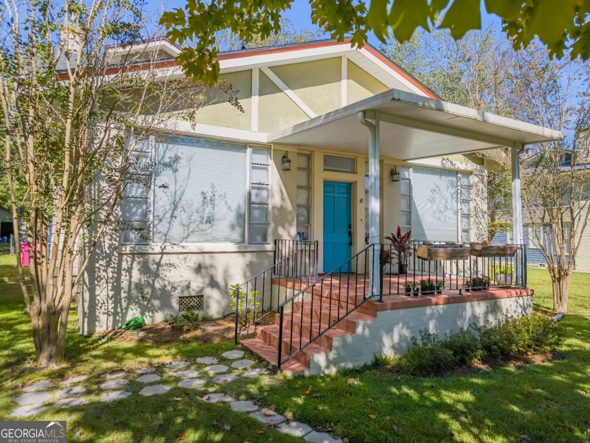 616 North Ridge Avenue Tifton, GA 31794 - Photo 1 of 1 a view of a house with a yard