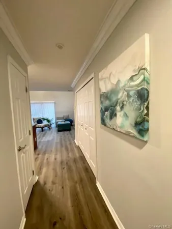 a view of a bedroom from a hallway