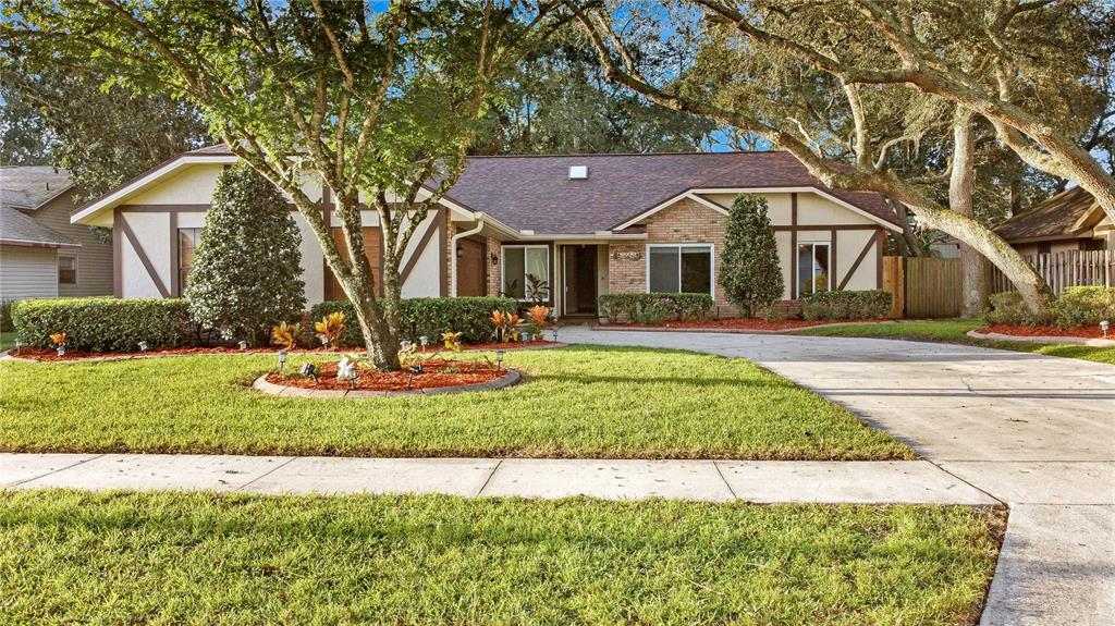 Act Quickly on this Good-Looking & Well-Priced Three-Bedroom, Two-Bath Single Family Home with Side-Entry TWO-CAR Garage on a Tree-Shaded Large Lot with a FENCED Backyard!