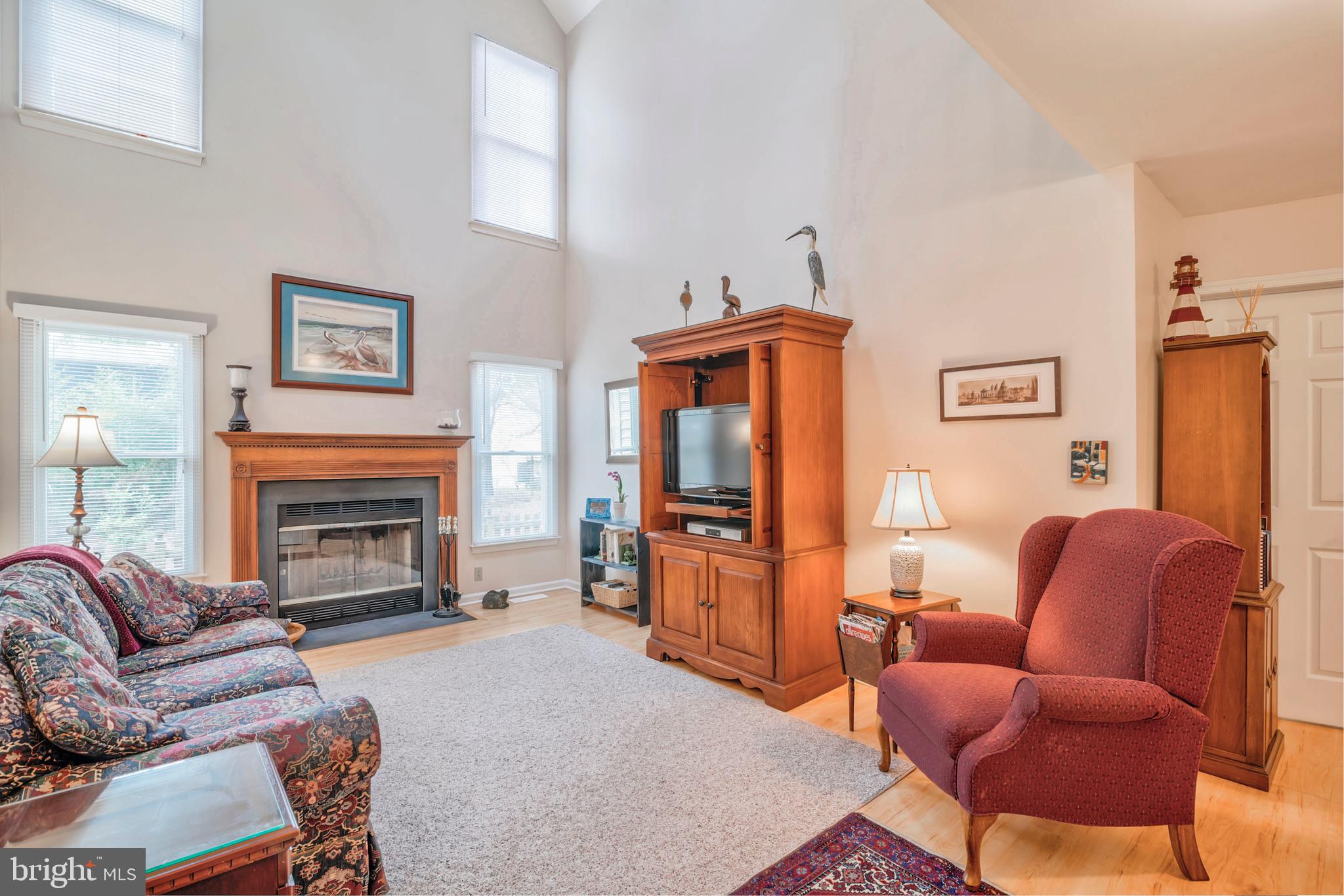 127 Watertown Road Ocean Pines, MD 21811 - Photo 5 of 39 Family room with gas fireplace vaulted ceiling