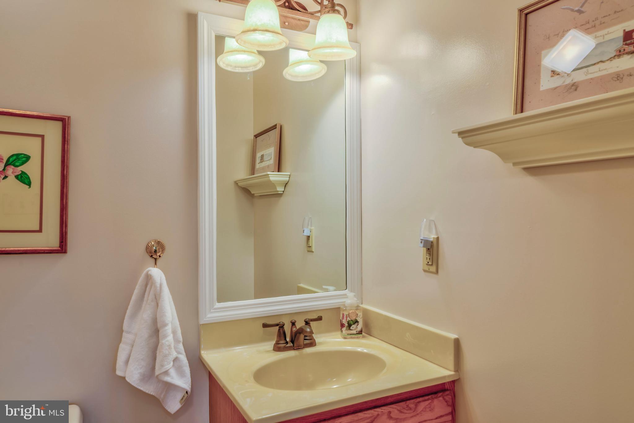 127 Watertown Road Ocean Pines, MD 21811 - Photo 8 of 39 Half bath for guests on 1st floor