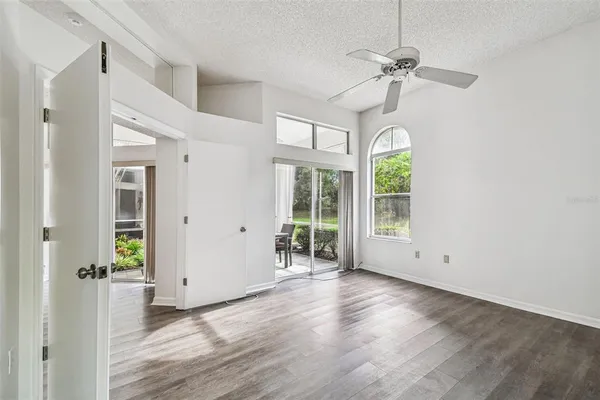 a view of an entryway with wooden floor