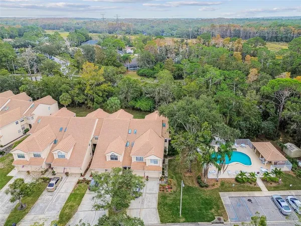 an aerial view of a house with a garden