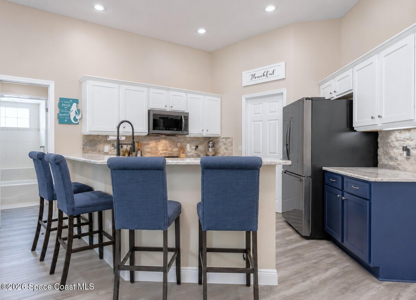 1697 Atrium Drive Melbourne, FL 32935 - Photo 7 of 36 Kitchen 2
