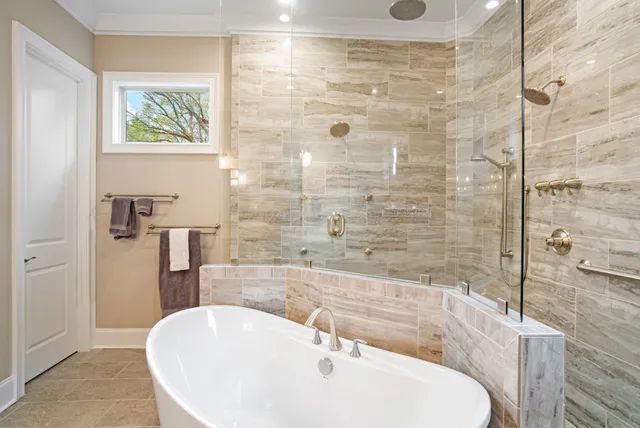 a bedroom with a bed and a lamp with the wooden floor