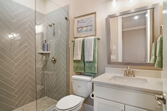 an aerial view of a house with a garden and swimming pool