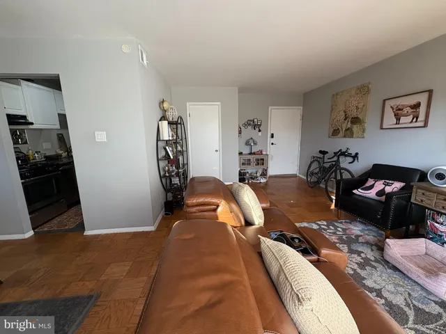 a bedroom with bed and a dresser