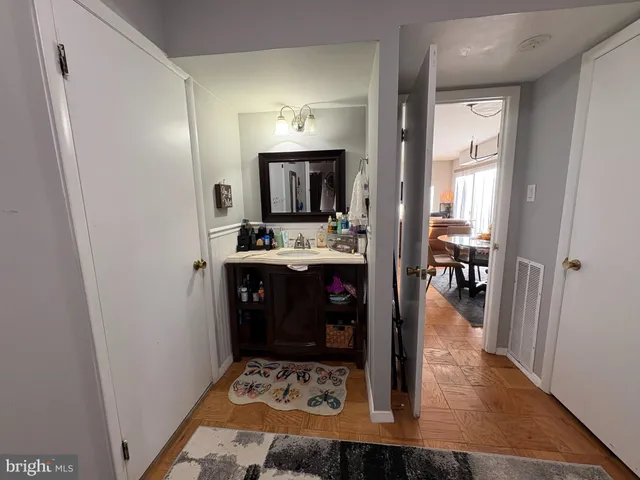 a view of living room with furniture and flat screen tv