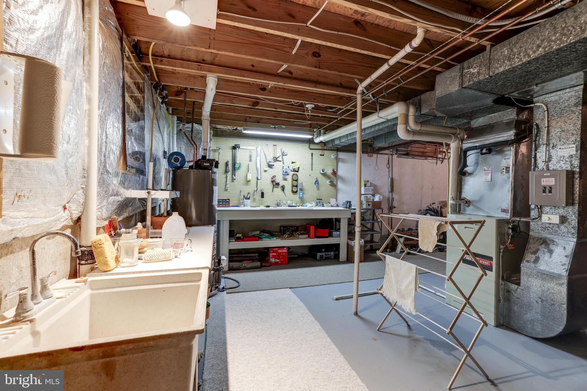 13221 Shady Ridge Lane Fairfax, VA 22033 - Photo 30 of 62 Huge Storage Area w/ Workbench & Utility Sink