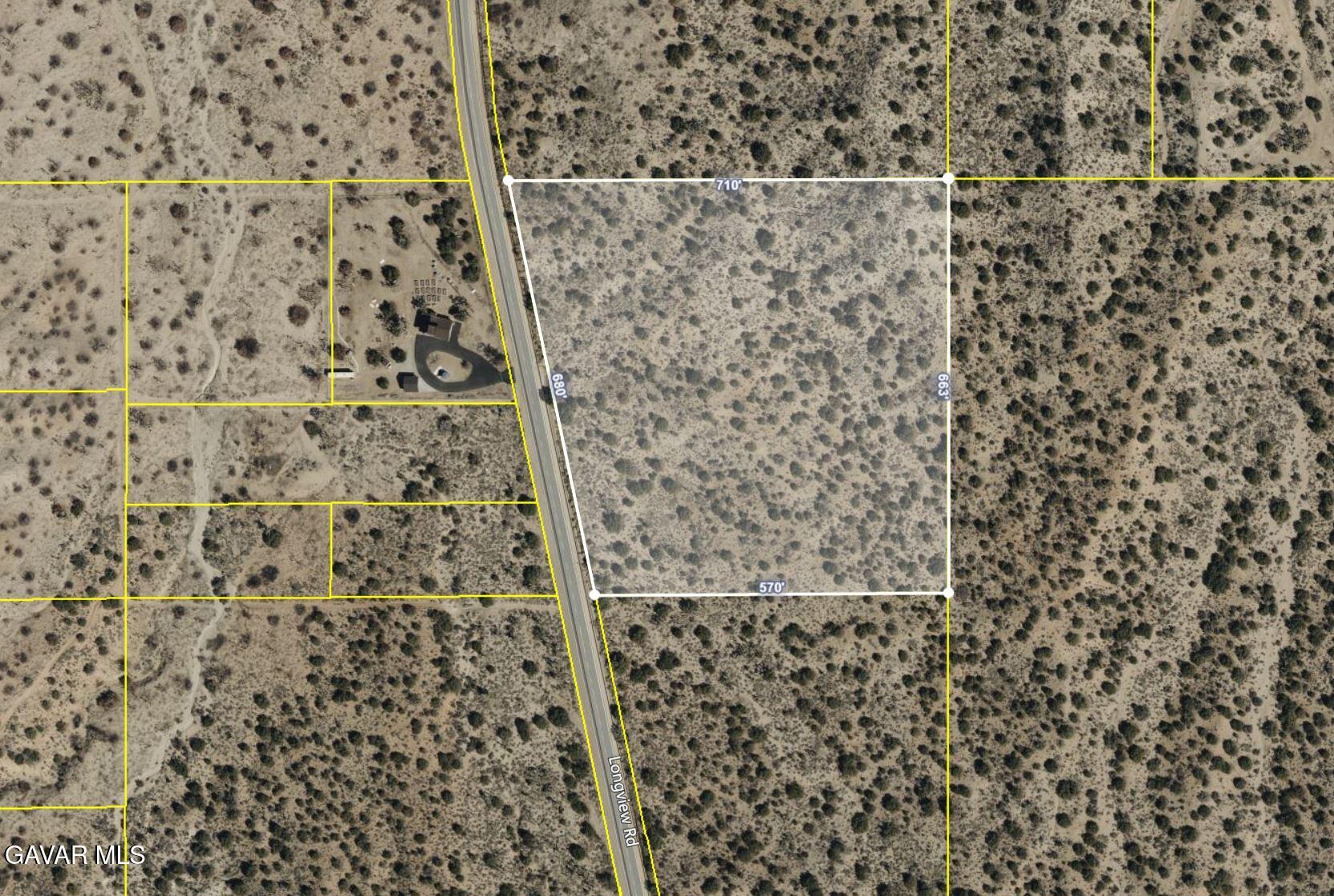 31550 Longview Road Pearblossom, CA 93553 - Photo 4 of 7 a bathroom with a shower curtain