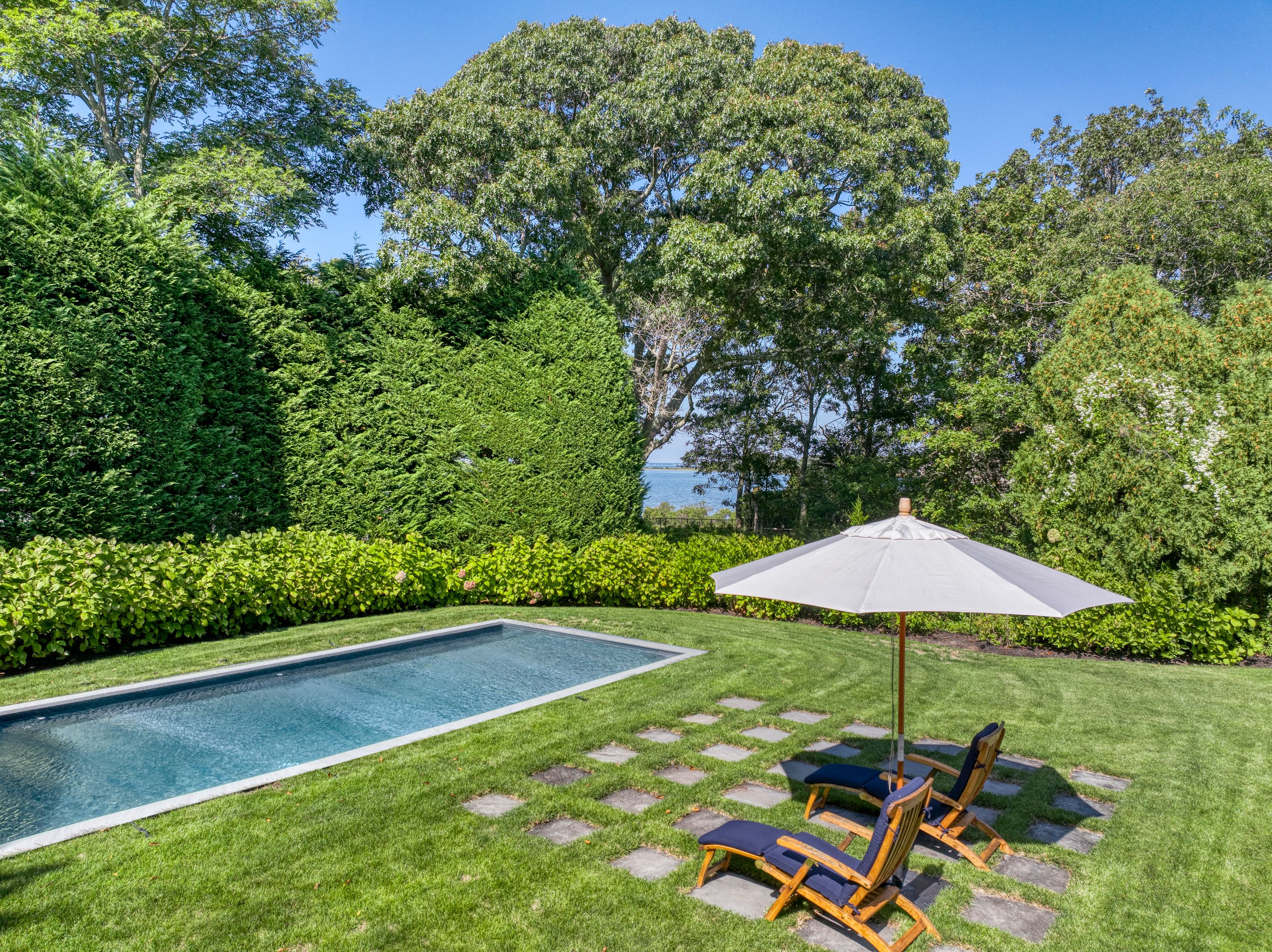 55 Shrubland Road Southampton, NY 11968 - Photo 3 of 15 Pool w/ Water Views