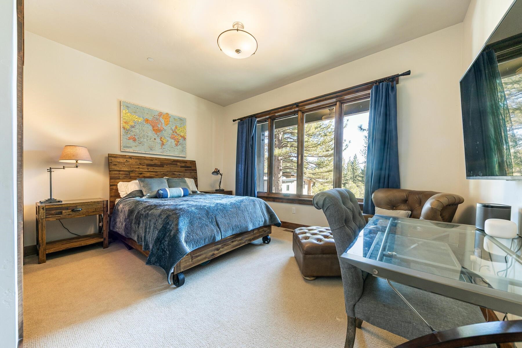 10789 Labelle Court Truckee, CA 96161 - Photo 14 of 28 a bedroom with a bed and wooden floor
