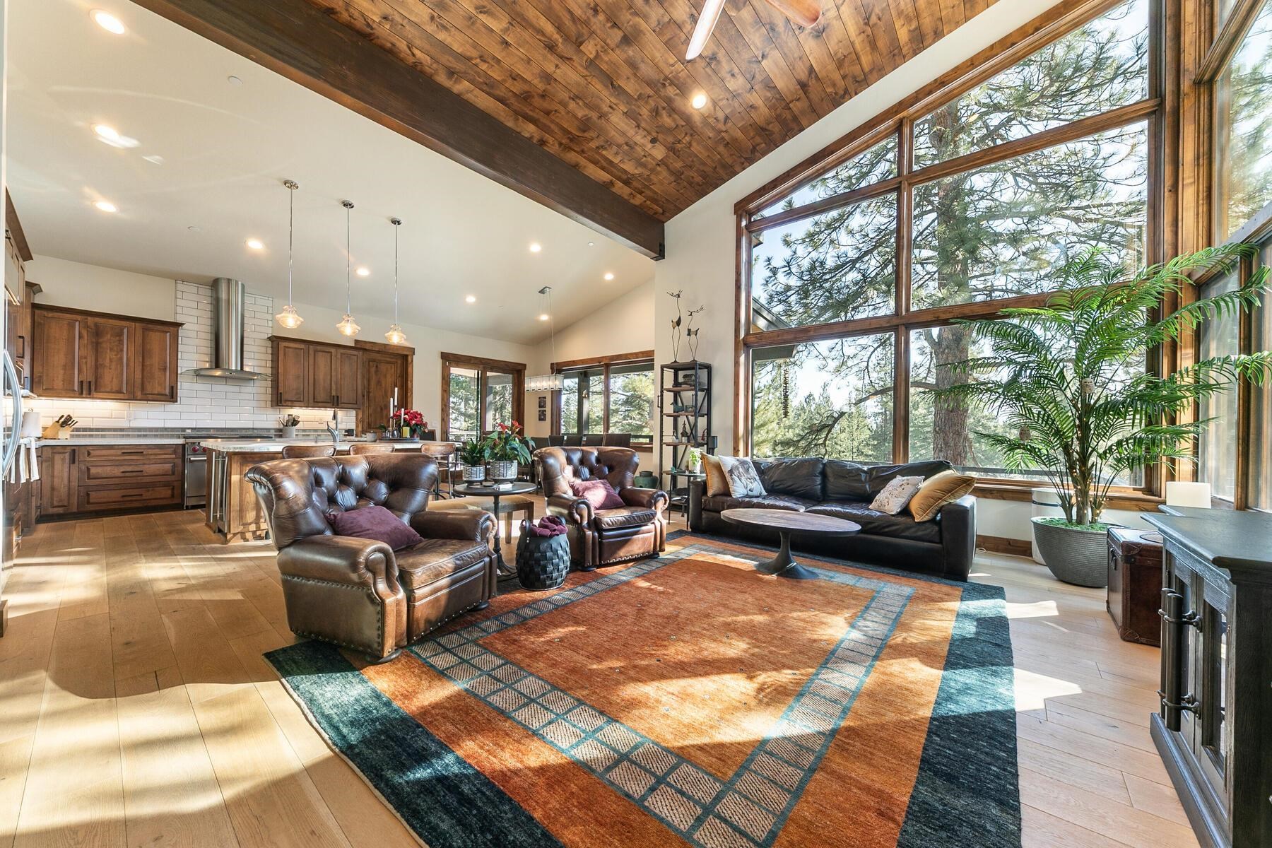 10789 Labelle Court Truckee, CA 96161 - Photo 7 of 28 a living room with furniture kitchen view and a large window