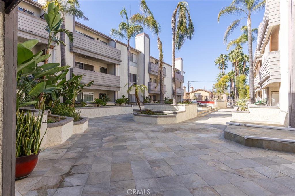20253 Keswick Street Winnetka, CA 91306 - Photo 20 of 22 a view of a building with a yard