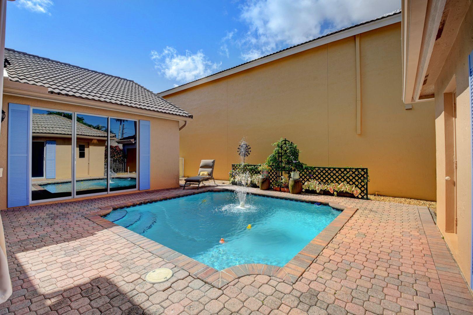 4398 Northwest 29th Way Boca Raton, FL 33434 - Photo 2 of 26 Courtyard