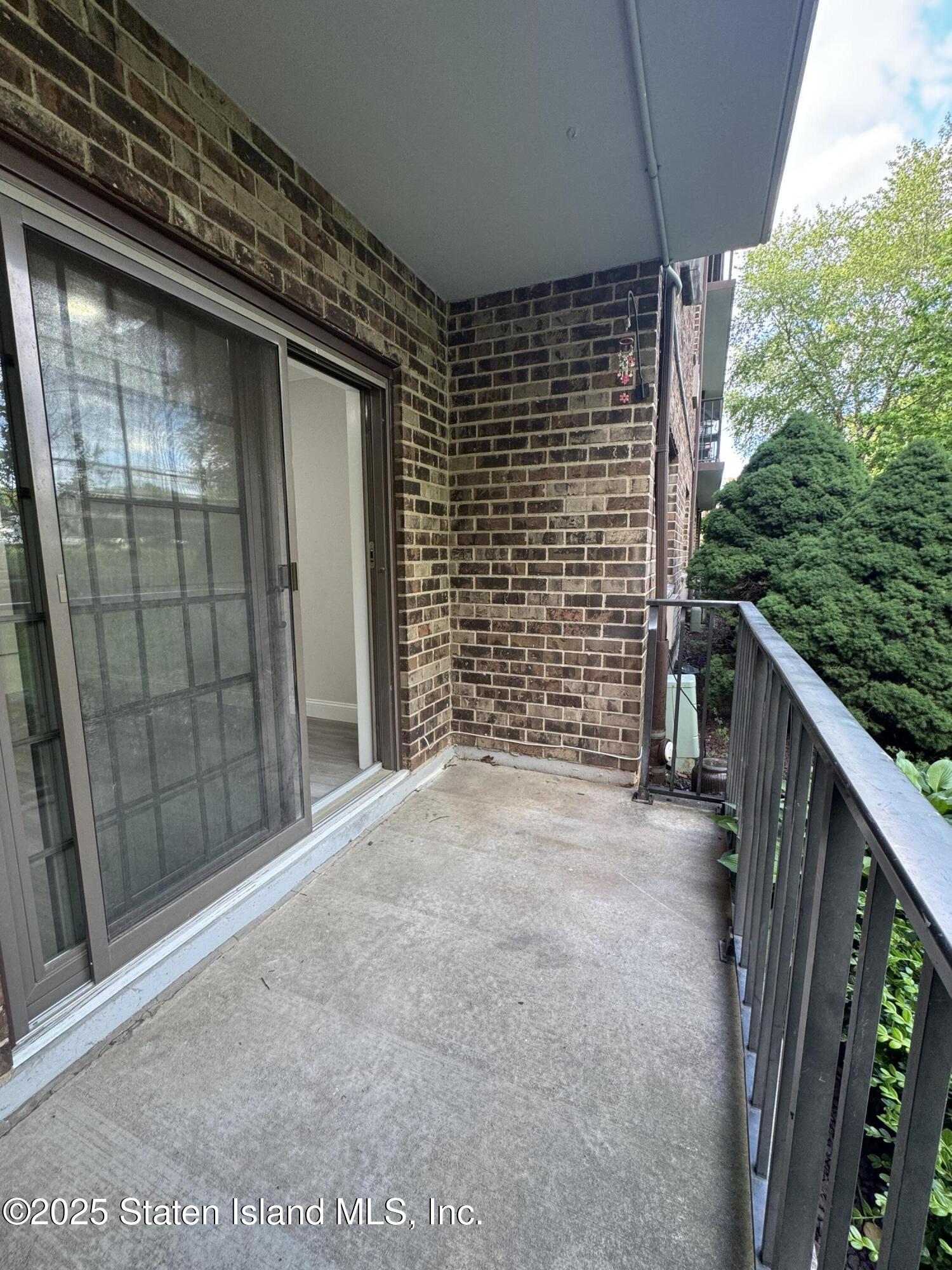 170 Devon Loop, Unit 2 Staten Island, NY 10314 - Photo 7 of 9 a view of backyard with green space