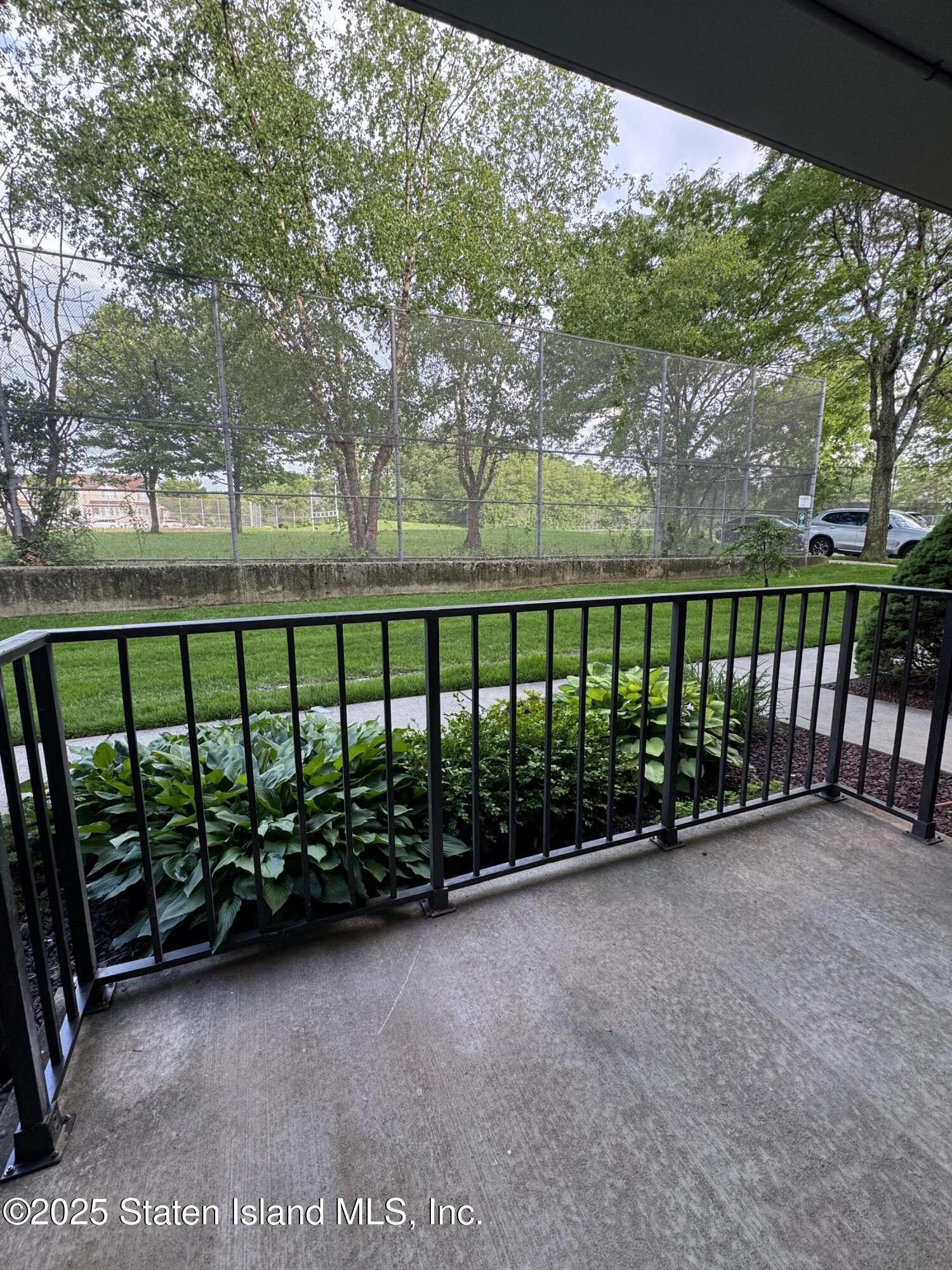 170 Devon Loop, Unit 2 Staten Island, NY 10314 - Photo 8 of 9 a view of a fence