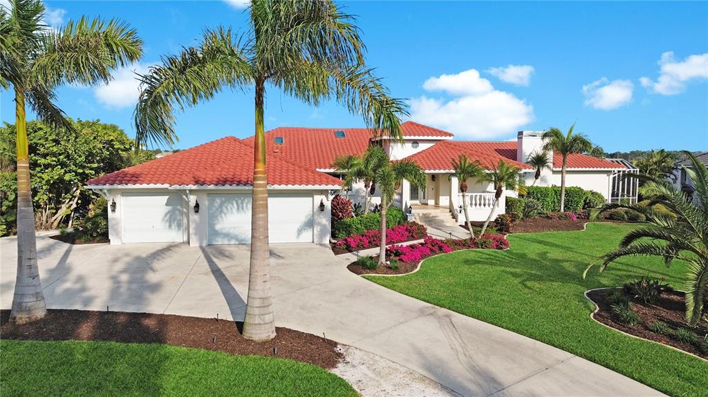 8115 Manasota Key Road Englewood, FL 34223 - Photo 11 of 67 a view of a backyard with a patio