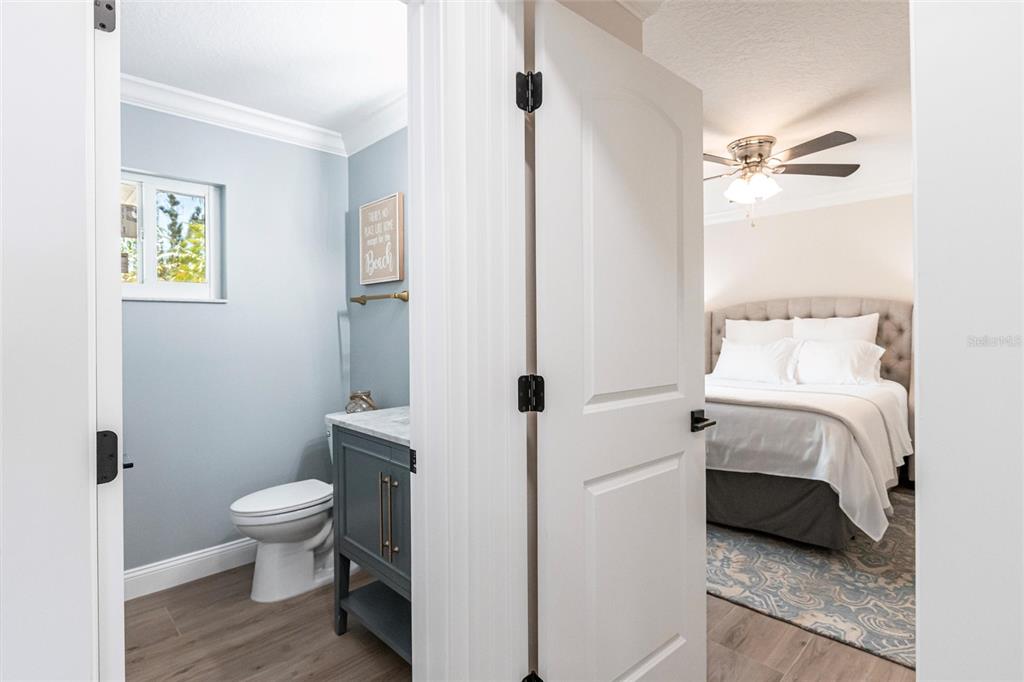 8115 Manasota Key Road Englewood, FL 34223 - Photo 51 of 67 a bathroom with a toilet and a shower