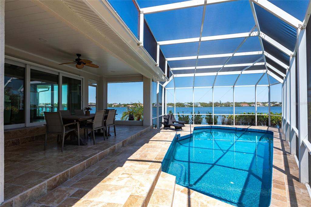 8115 Manasota Key Road Englewood, FL 34223 - Photo 63 of 67 a room with lots of tables and chairs