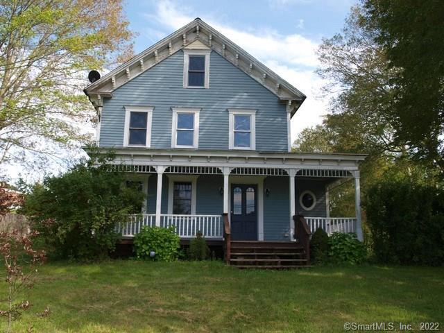 81 Hartford Road Brooklyn, CT 06234 - Photo 1 of 1 a view of a brick house with a yard