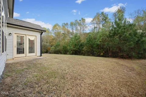a house with trees in front of it