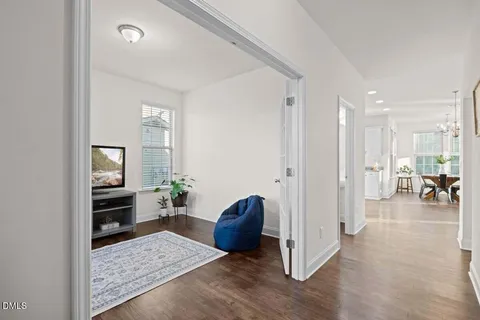 a living room with furniture and a table